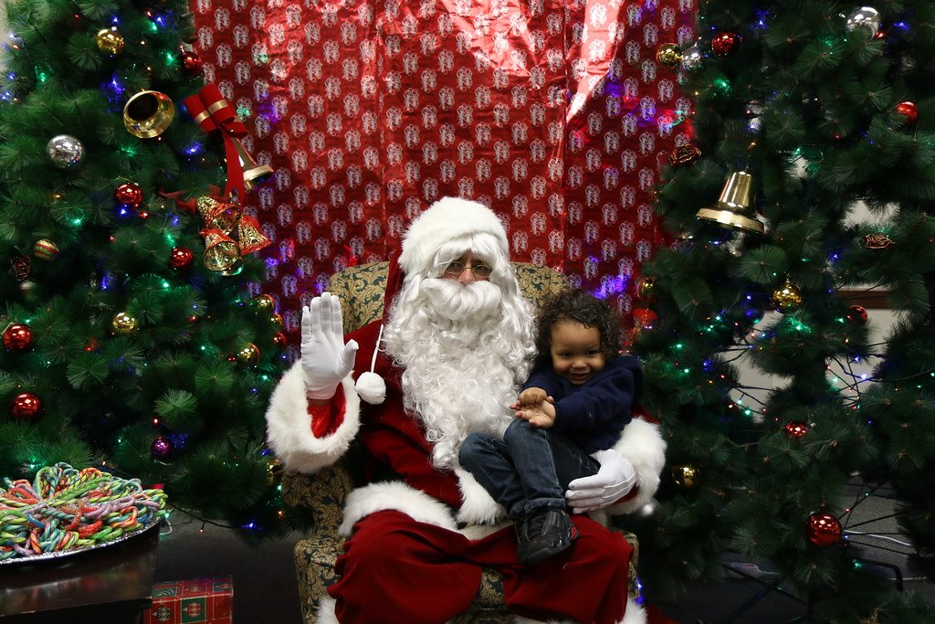 image of Santa holding a child